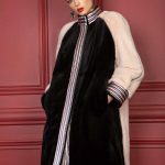 Bomber style mink coat in two shades with shimmering leather hand grafted seams in narrow strips