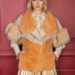 Mink & swakara vest with finn racoon trimming & shimmering leather piping