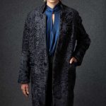 Swakara lapel-less coat in Navy Blue with leather collar & piping