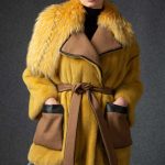 Mink jacket with asymmetrical Finn Racoon collar in Nugget Gold color